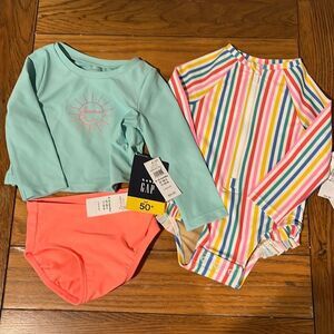 Gap/Old Navy bundle of two Swimsuits for 6-12 months Girlss.